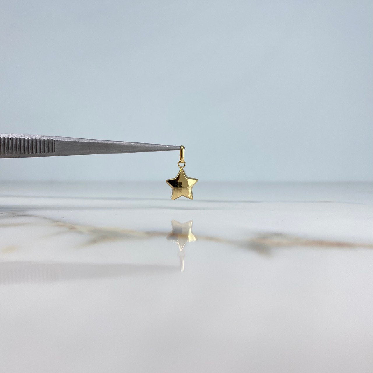 Dije Estrella Soplado 0.6gr / 1.8cm / Liso Oro Amarillo &