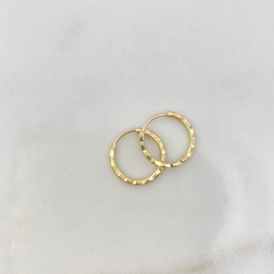 Candongas Kathe 0.6gr / 1cm / Diamantado Oro Amarillo $