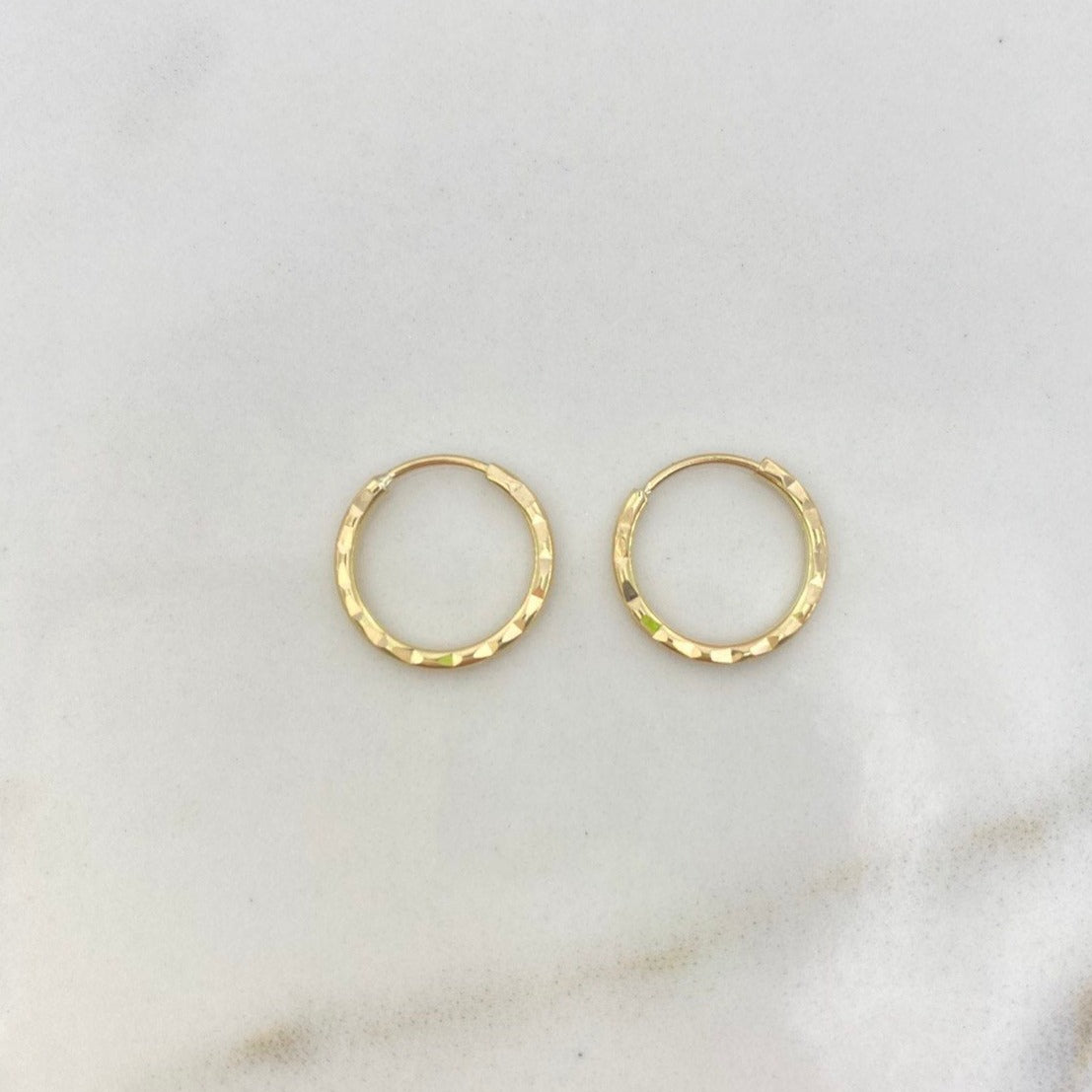 Candongas Kathe 0.6gr / 1cm / Diamantado Oro Amarillo $