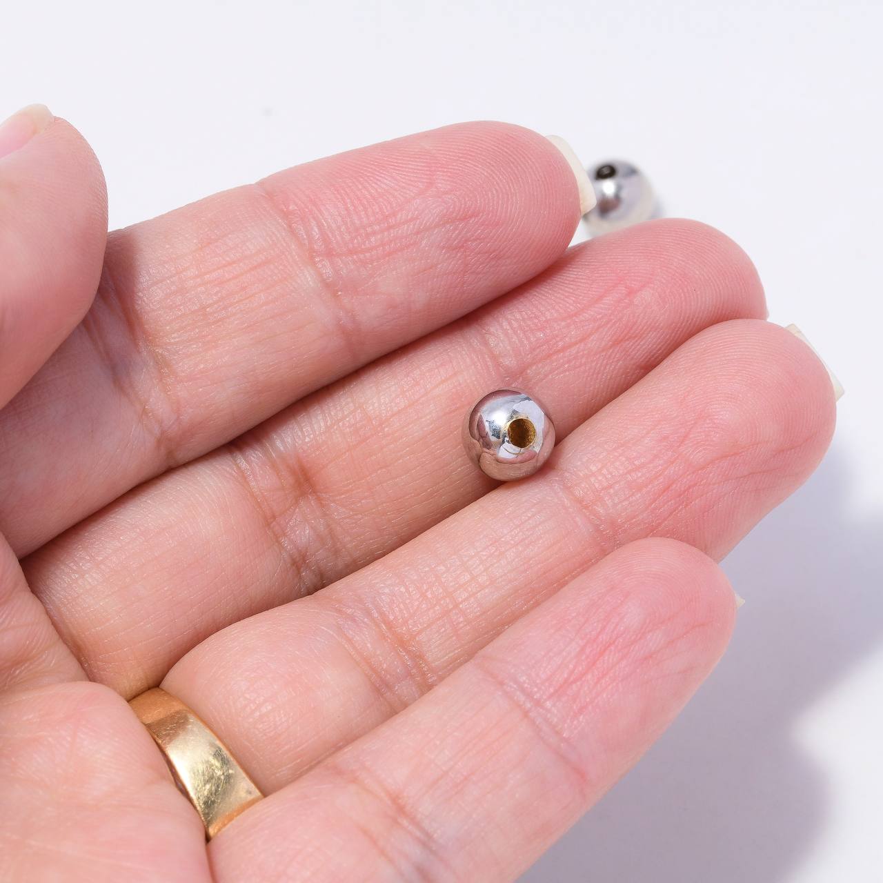 Bola Lisa 7mm Oro Blanco $