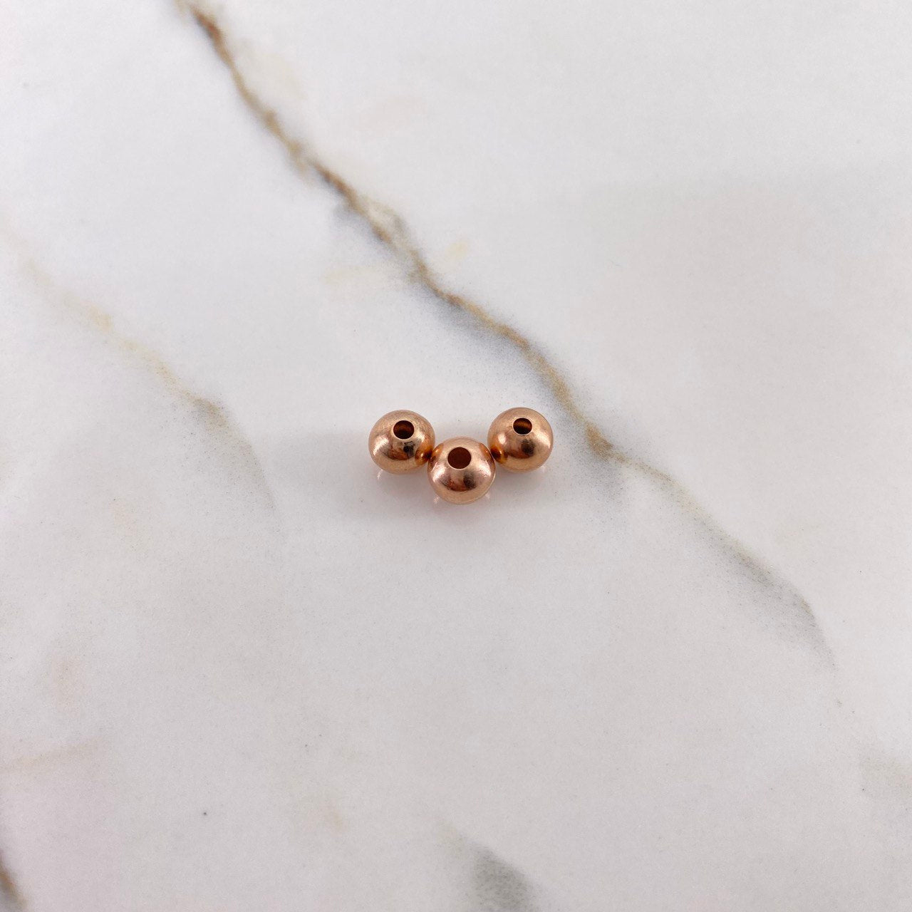 Bola Lisa 7mm Oro Rosa $