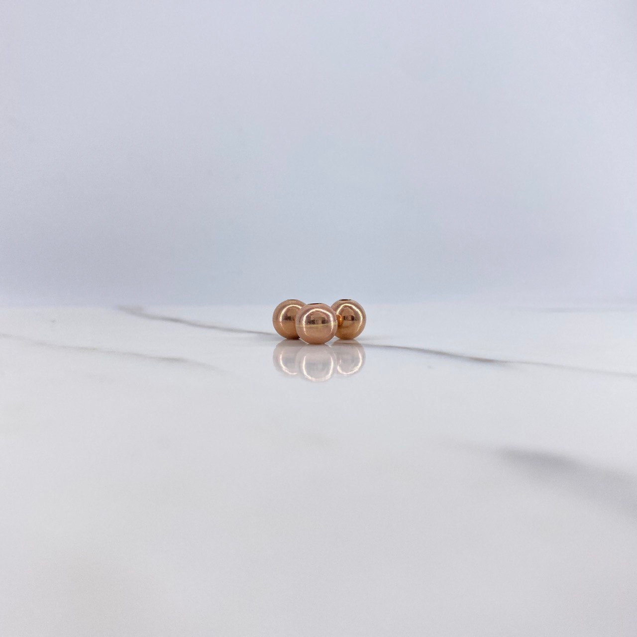 Bola Lisa 7mm Oro Rosa $