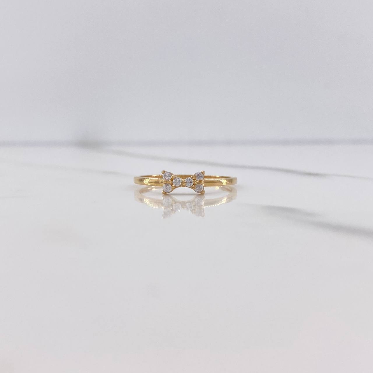 Anillo Moño 1.1gr / T6 / Circones Blancos Oro Amarillo $