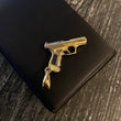 Dije Pistola 9.25gr / 4.5cm Circones Negros Dos Oros Amarillo Blanco