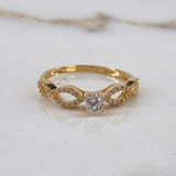Anillo Infinitos  2.35gr / T8 3/4  / Oro Amarillo$