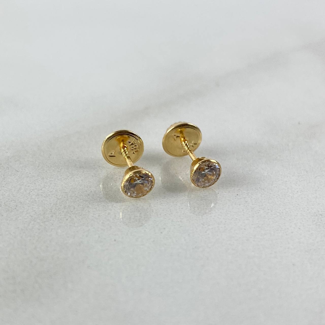 Topos Bisel 0.55gr / 4mm Circon Blanco Oro Amarillo (Joya) ©