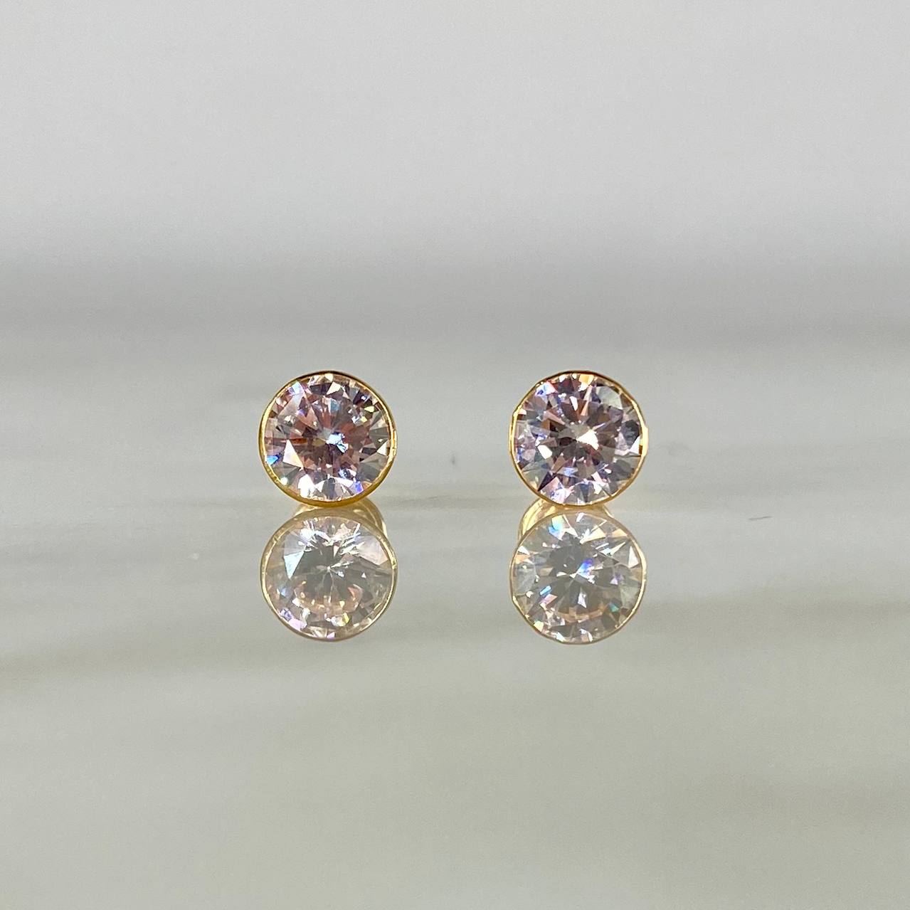 Topos Bisel 1.45gr / 7mm Circon Blanco Oro Amarillo 18K