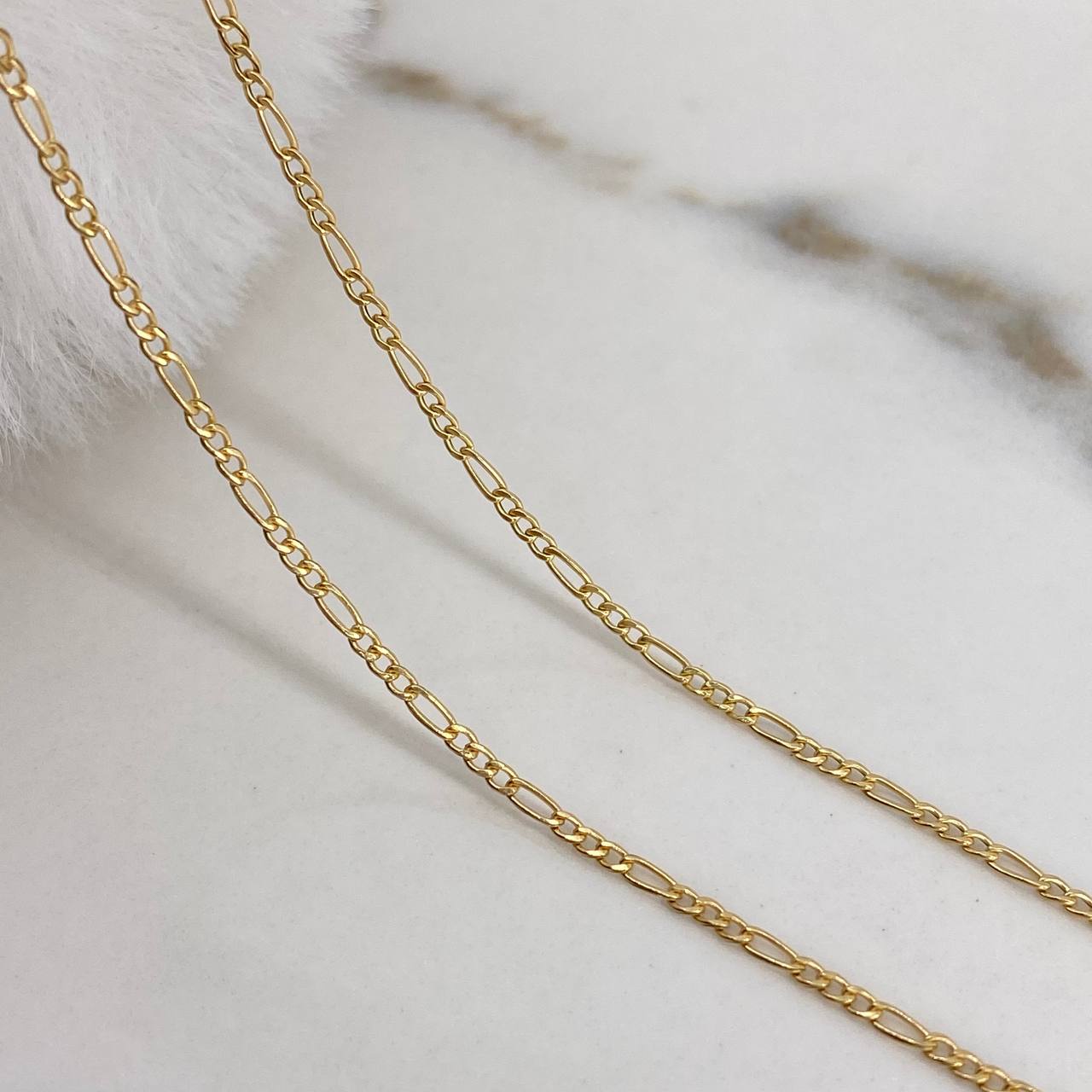 Cadena Figaro 1.25gr / 50cm / 1.5mm Oro Amarillo +1$