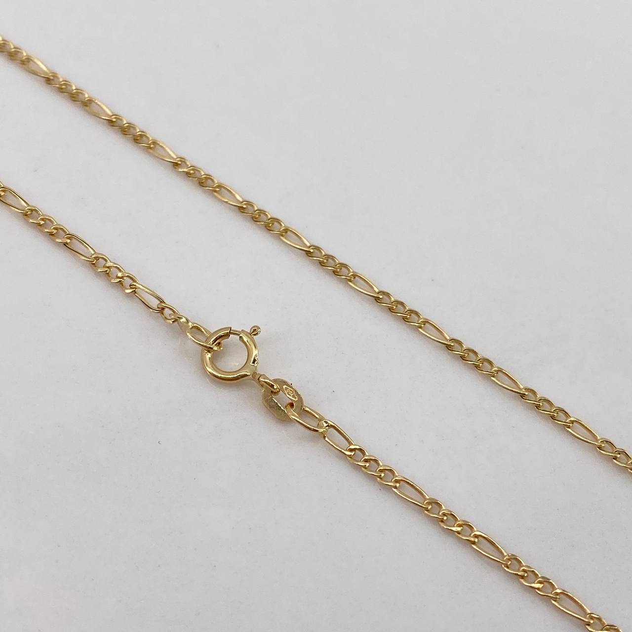 Cadena Figaro 1.25gr / 50cm / 1.5mm Oro Amarillo +1$