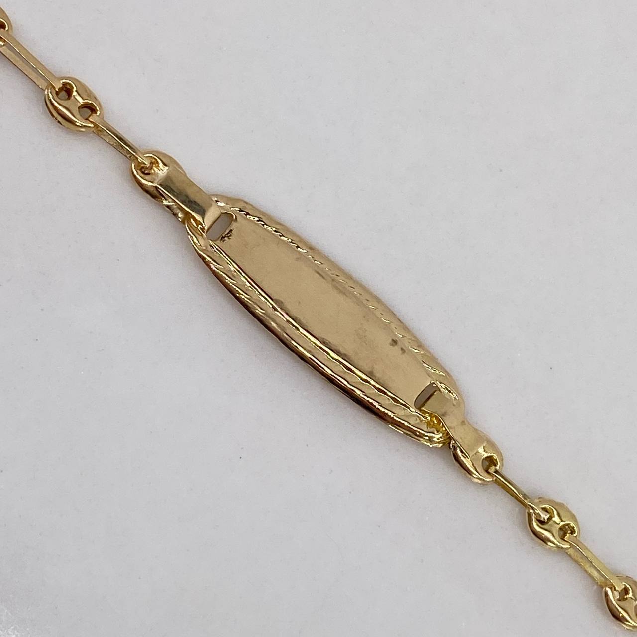 Pulso Bebé GC 1.75gr / 16cm / Placa Ovalo Bordeado  Oro Amarillo