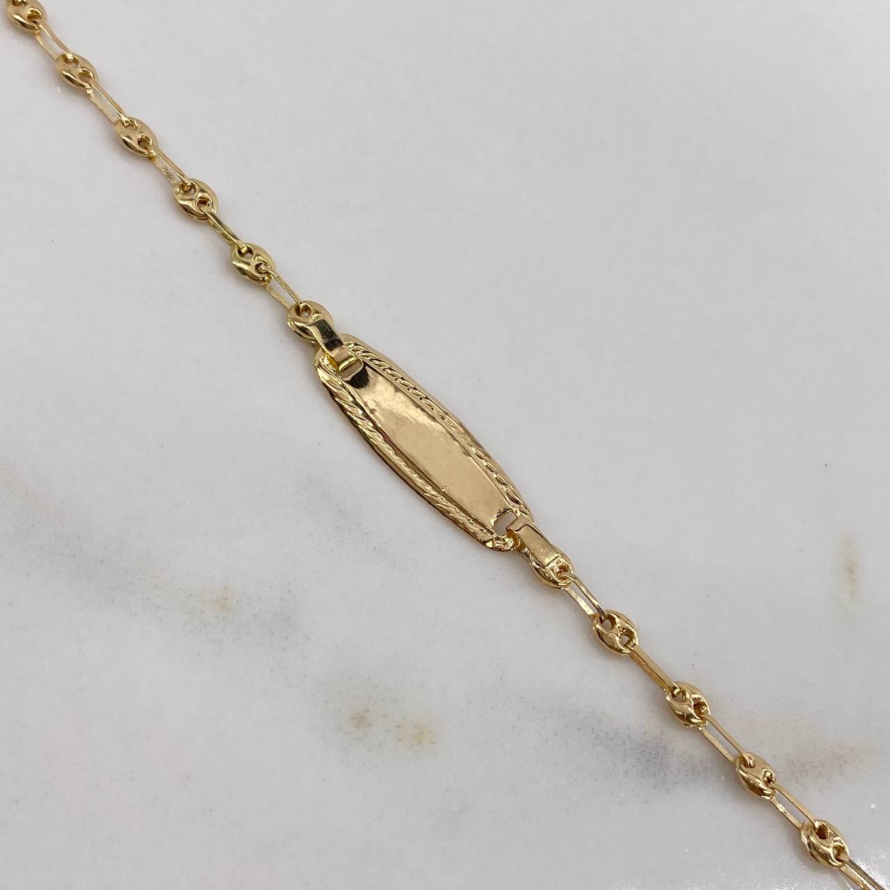Pulso Bebé GC 1.75gr / 16cm / Placa Ovalo Bordeado  Oro Amarillo