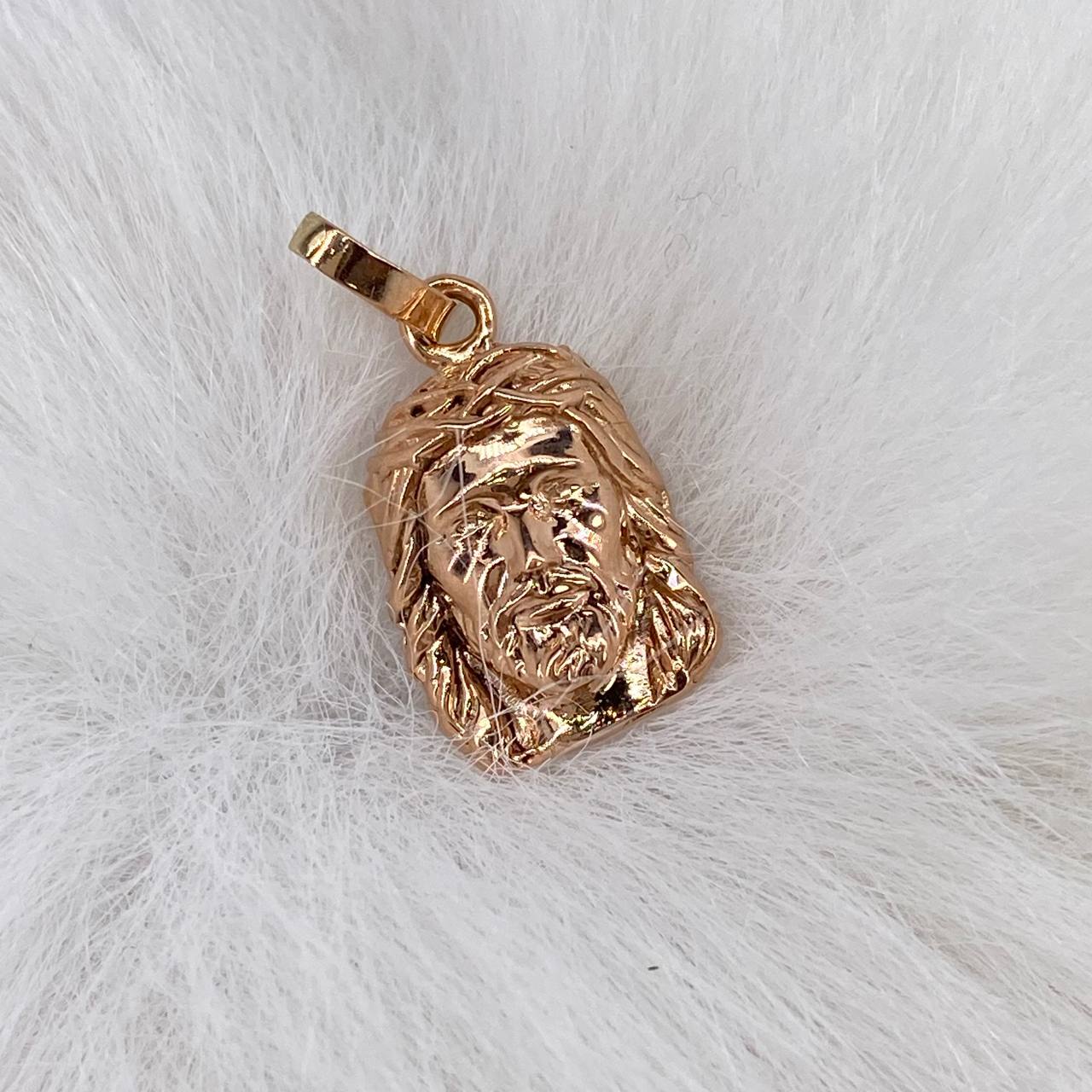 Dije Rostro de Cristo 1.9gr / 2cm / Liso Oro Rosa$