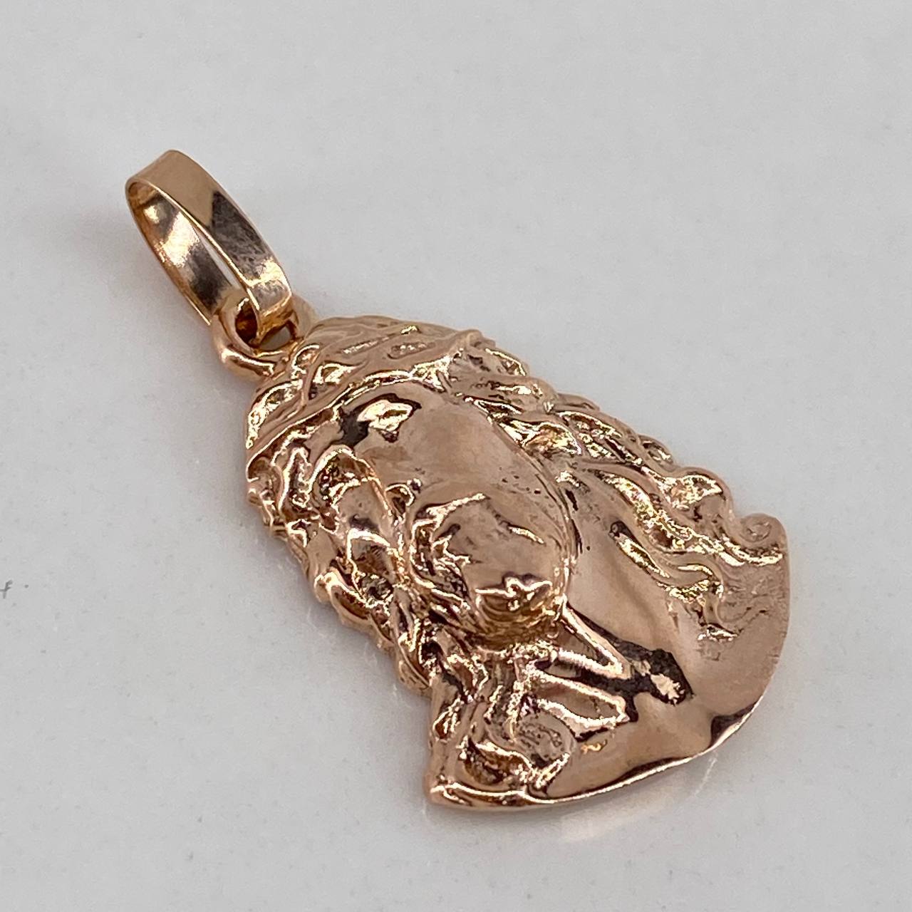 Dije Rostro de Cristo 2.45gr / 2.5cm / Liso Oro Rosa$