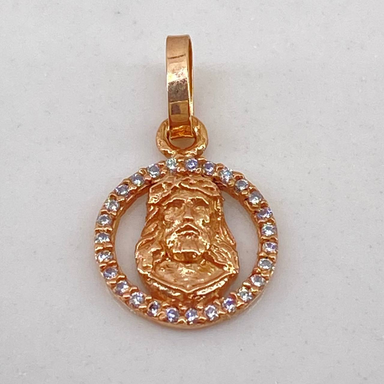 Dije Rostro de Cristo 0.65gr / 1.5cm / Circones Blancos Oro Rosa $