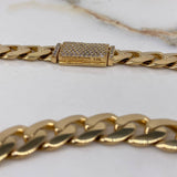 Cadena Cubana  56.3gr / 60cm / 9.85mm Broche Especial Circones Blancos  Oro Amarillo Nac.Esp  $