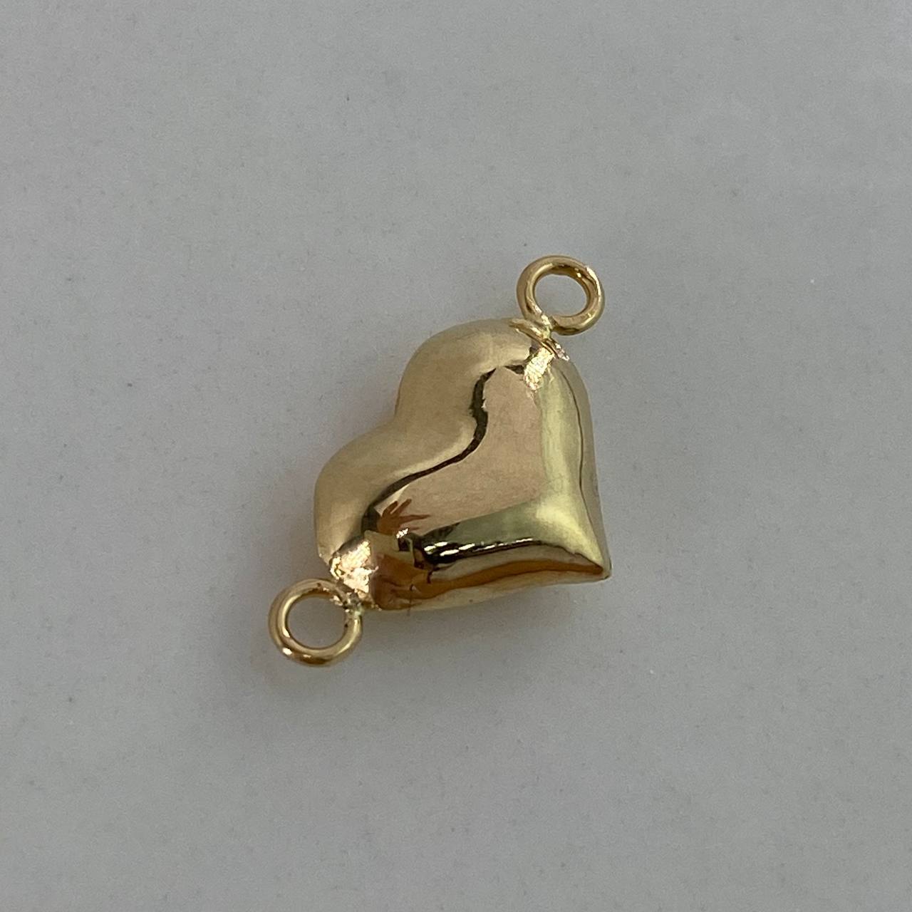 Herraje Corazon  0.55gr / 2cm / Soplado  Oro Amarillo $