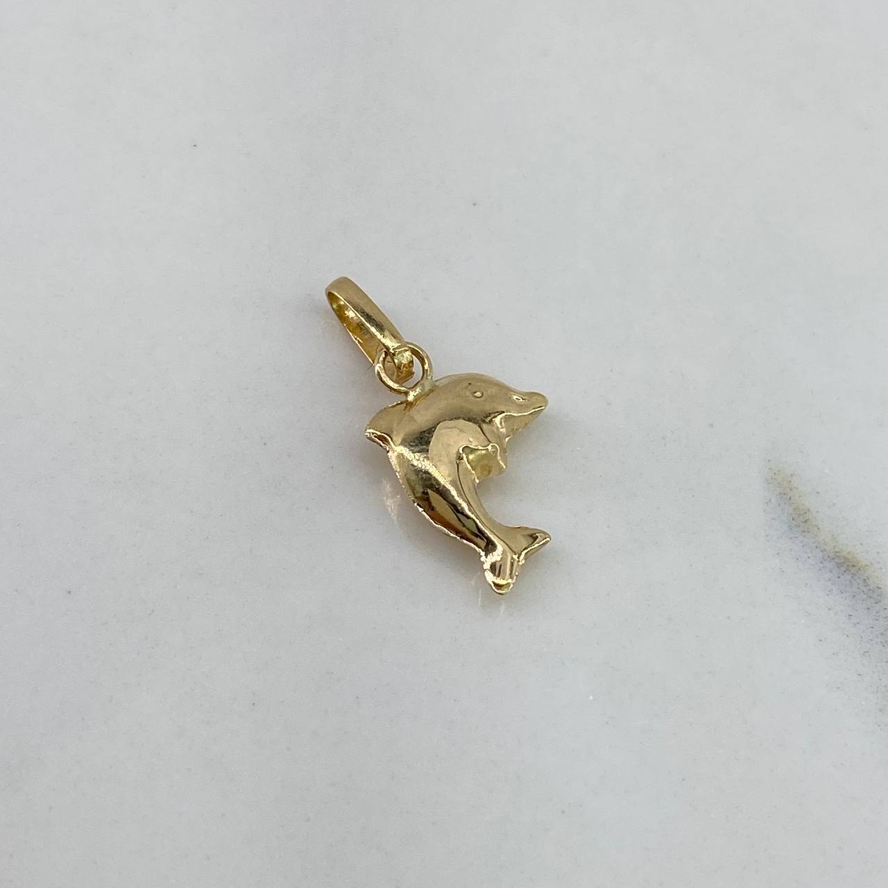 Dije Delfín 0,45gr / 1,5cm / Liso Oro Amarillo$