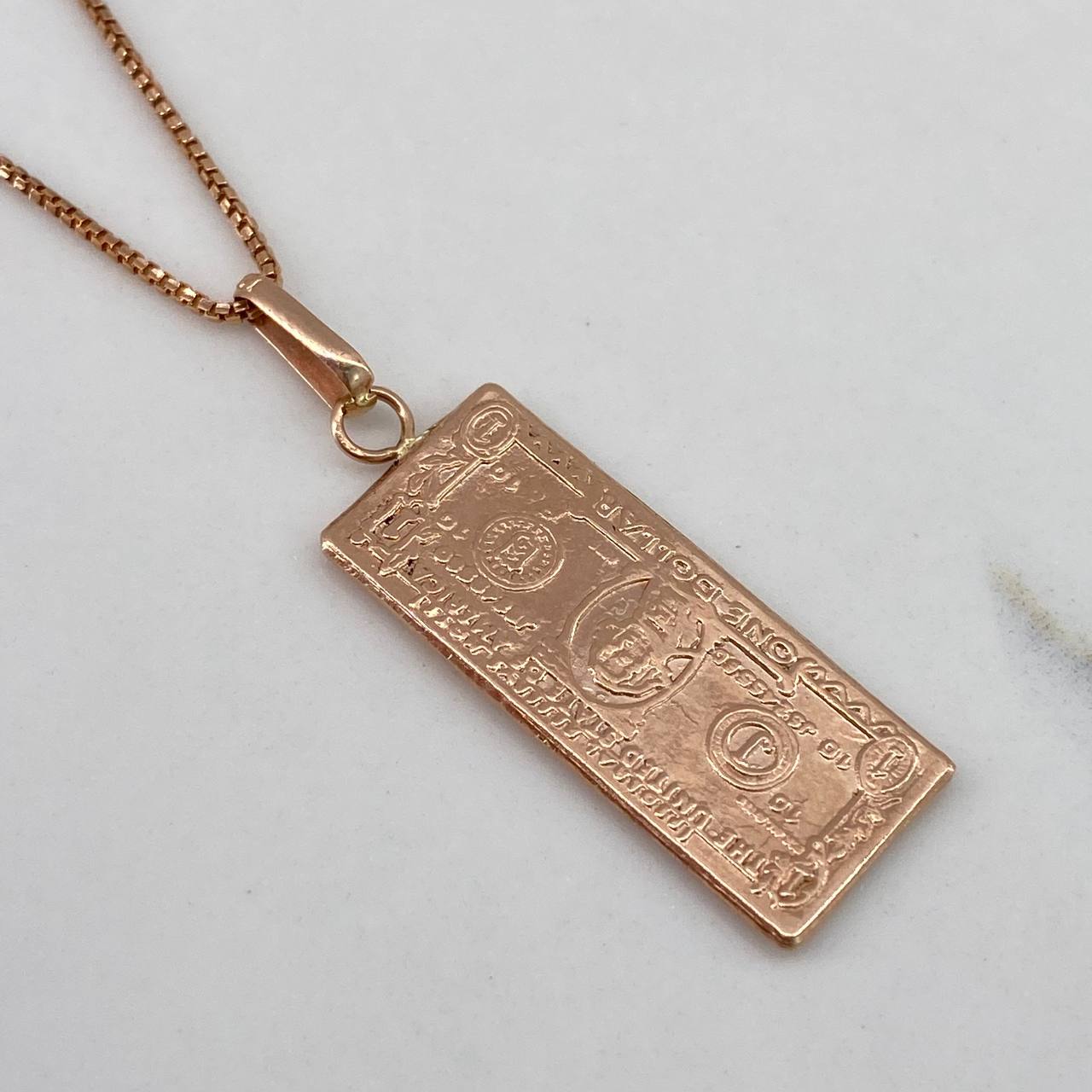Dije Dollar  1.5gr / 3.5cm / Liso  Oro Rosa$