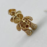 Dije Oso Articulado  4.45gr / 2.5cm / Circones Blancos Negros Bufanda  Oro Amarillo$