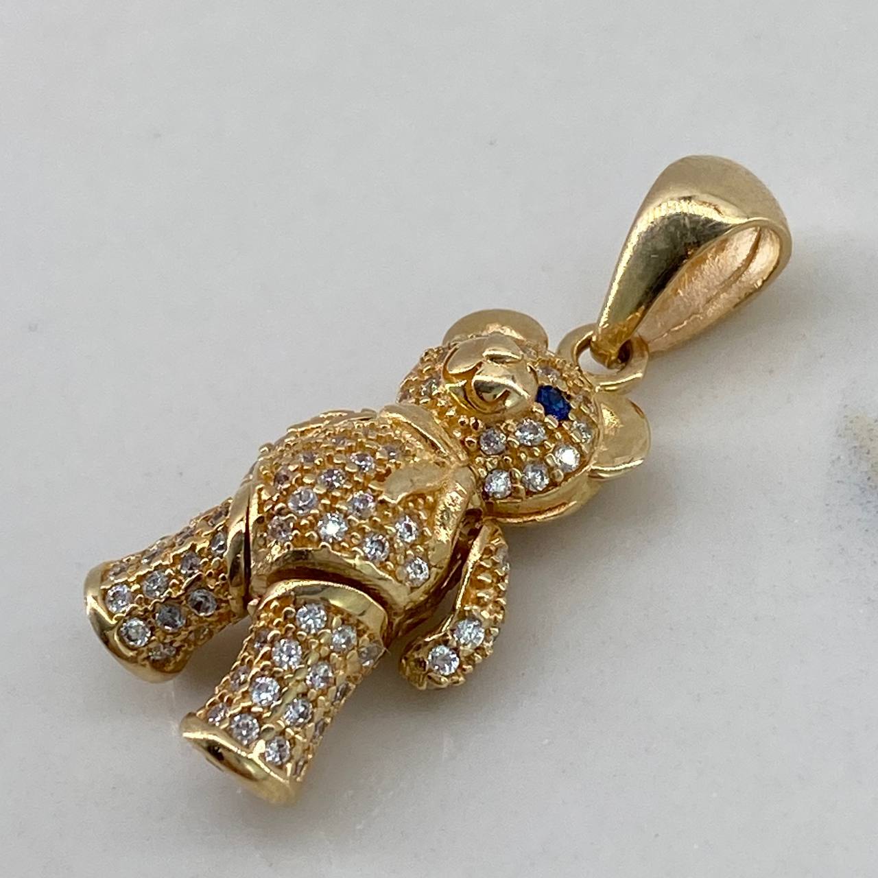 Dije Oso Articulado  4.6gr / 2.5cm / Circones Blancos Azules Bufanda  Oro Amarillo$