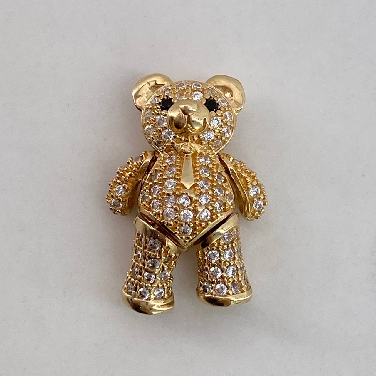 Dije Oso Articulado  3.8gr / 2cm / Circones Blancos Negros Corbata Oro Amarillo$