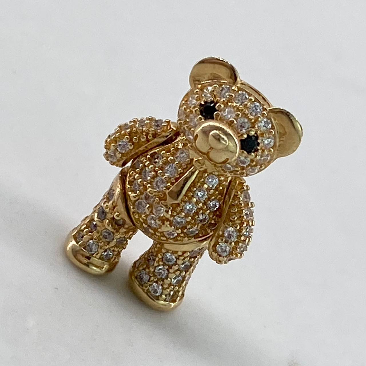Dije Oso Articulado  3.8gr / 2cm / Circones Blancos Negros Corbata Oro Amarillo$