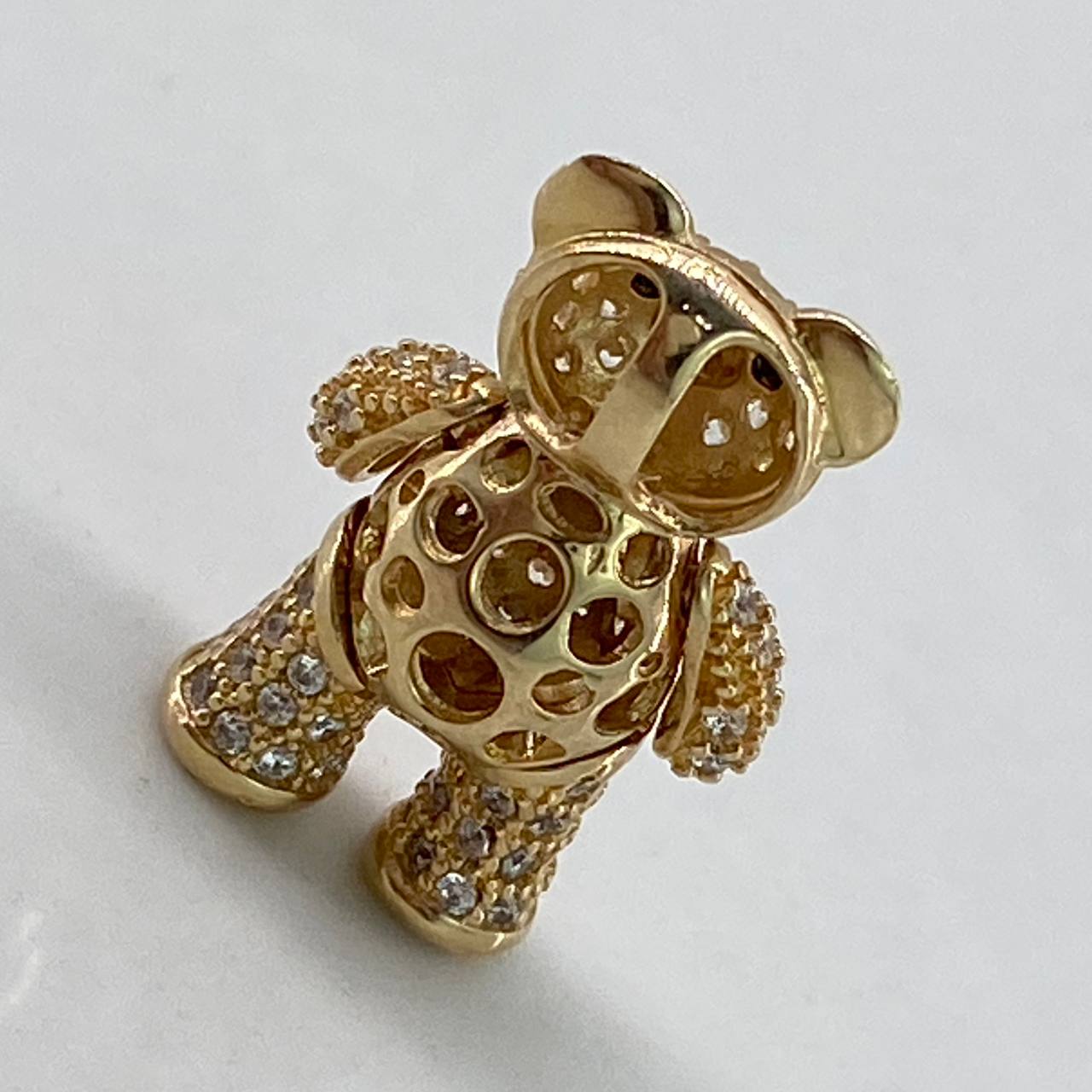 Dije Oso Articulado  3.8gr / 2cm / Circones Blancos Negros Corbata Oro Amarillo$