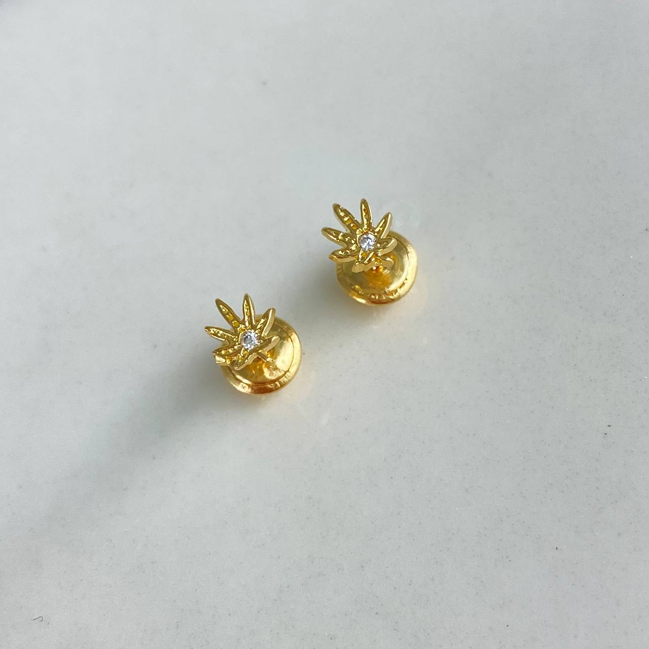 Topos Marihuana  0.7gr / Circones Blancos  Oro Amarillo$