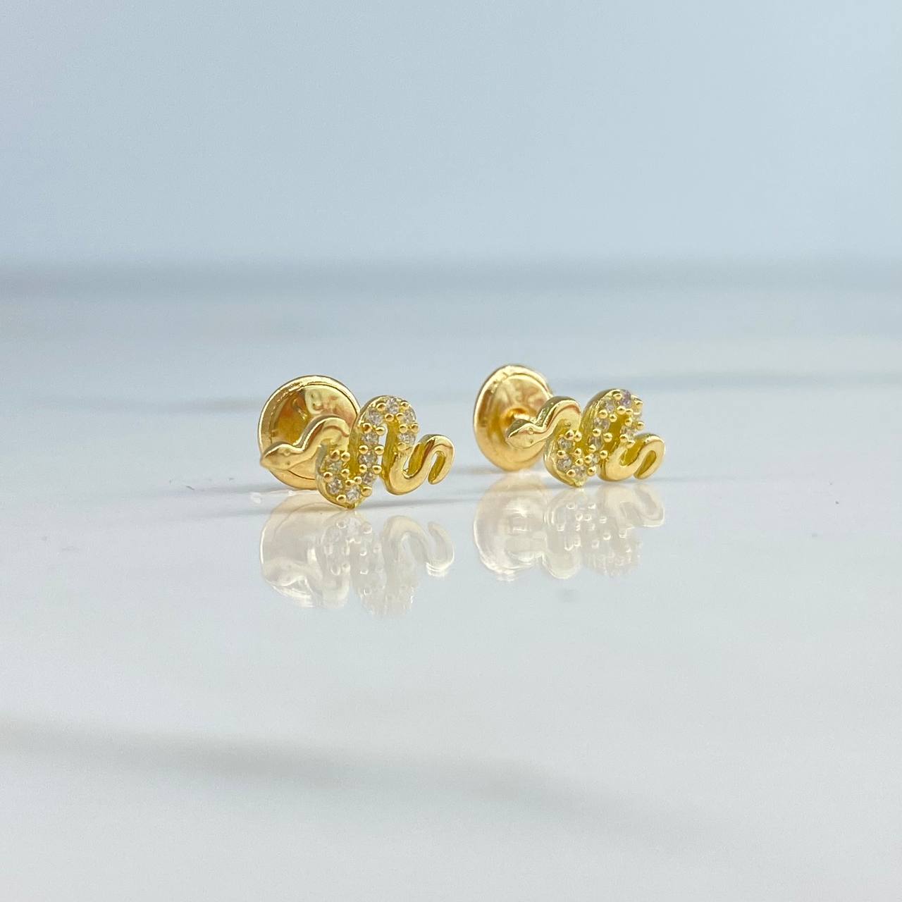 Topos Serpiente  0.95gr / Circones Blancos  Oro Amarillo$