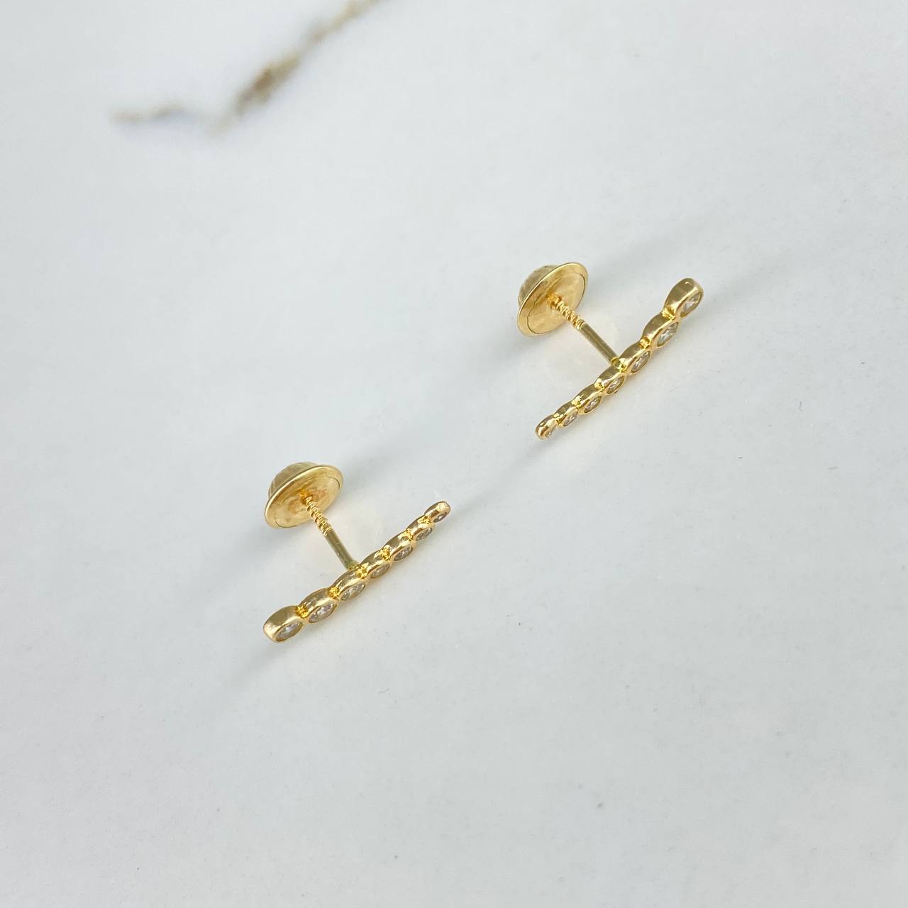 Topos Arco  0.9gr / Circones Blancos  Oro Amarillo$