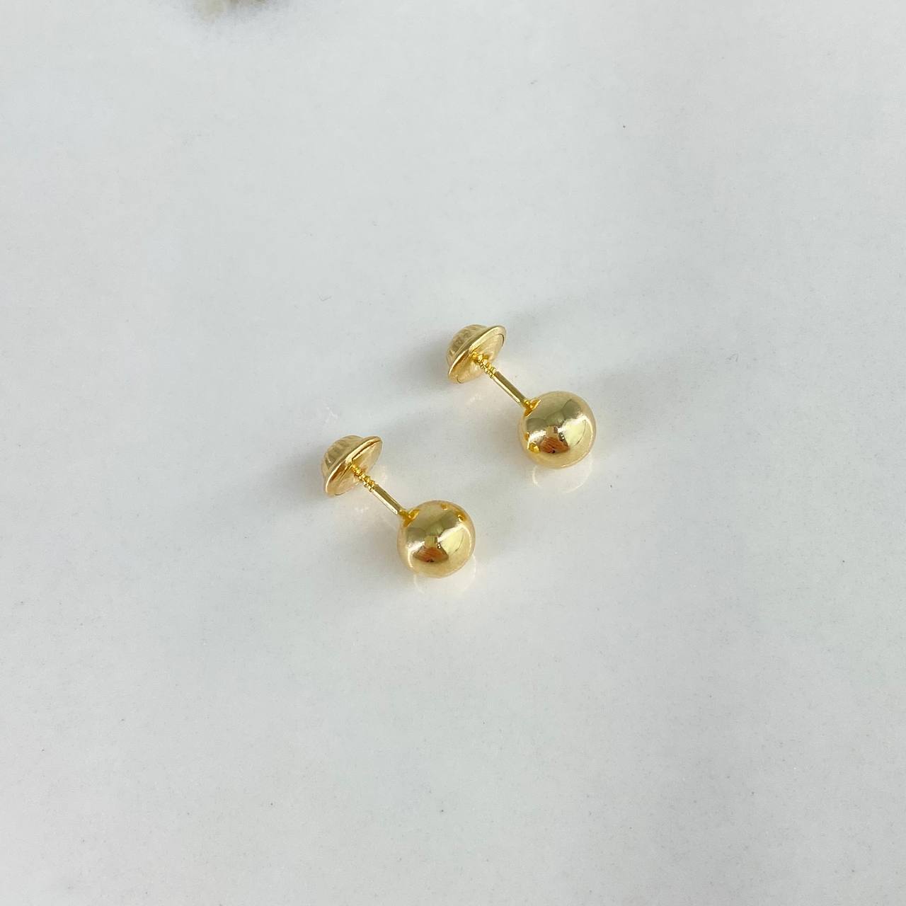 Topos Bola Lisa 0.6gr / 6mm Oro Amarillo$