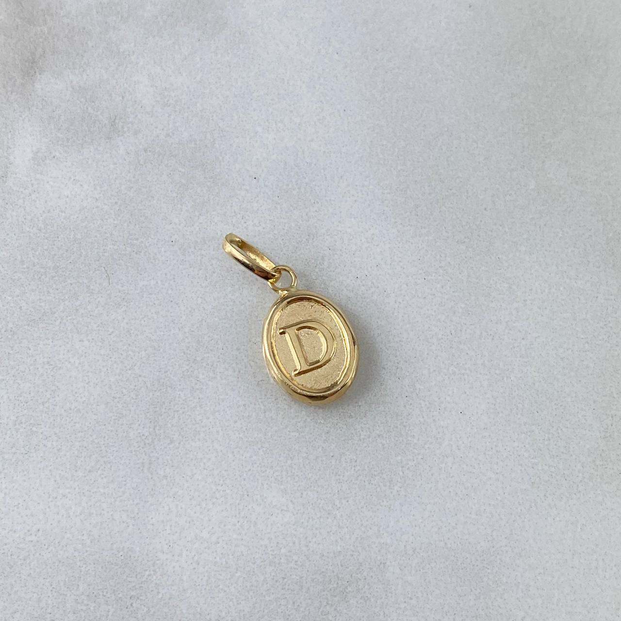 Dije Letra D Ovalada 0.55gr / 1.8cm / Troquelada Oro Amarillo ©