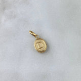 Dije Letra D Ovalada 0.55gr / 1.8cm / Troquelada Oro Amarillo ©