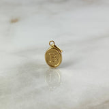Dije Letra E 0.5gr / 1.8cm / Oro Amarillo ©