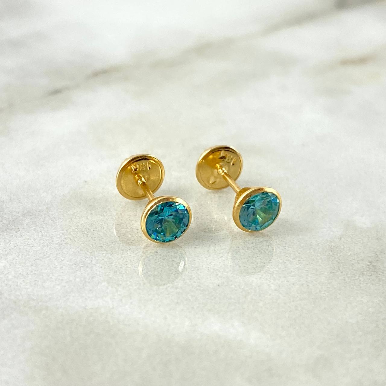 Topos Bisel 0.8gr / 5mm Circon Celeste Oro Amarillo (Joya) ©
