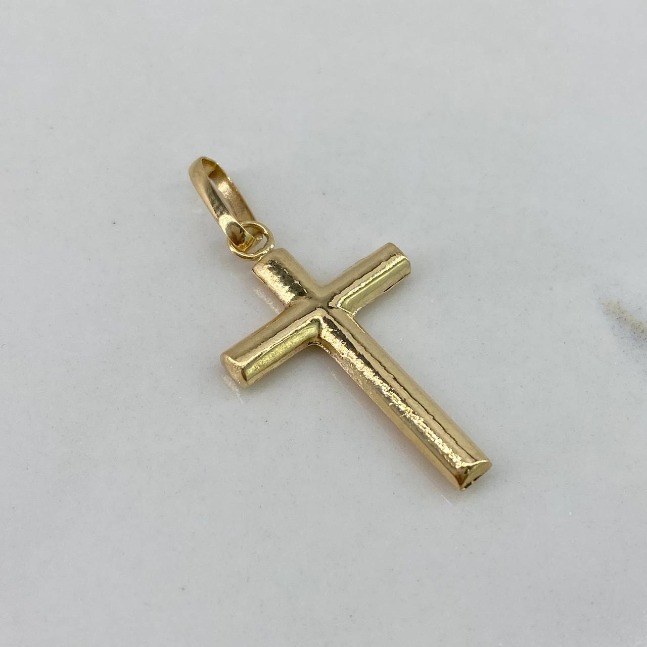 Dije Cruz  0.8gr / 3cm / Lisa Redondeada  Oro Amarillo $