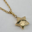 Dije Estrella  0.6gr / 1.5cm / Liso  Oro Amarillo $