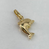Dije Delfin  0.45gr / 2cm / Liso  Oro Amarillo $