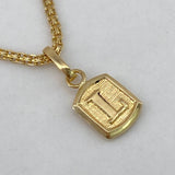 Dije Marco Letra L 0.3gr / 1.5cm / Liso  Oro Amarillo $