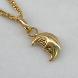 Dije Rostro Media Luna  0.3gr / 1.5cm / Liso  Oro Amarillo $