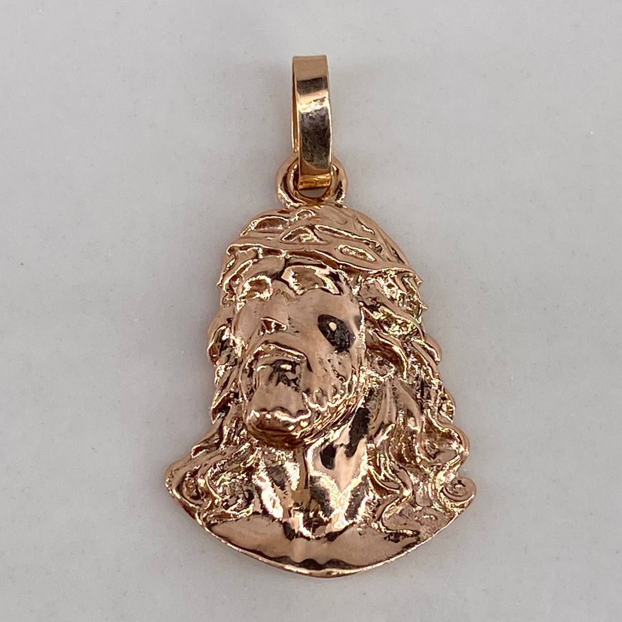 Dije Rostro de Cristo 2.4gr / 2.5cm / Liso Oro Rosa $