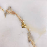 Dije Huella  0.55gr / 1.5cm / Liso  Oro Amarillo &
