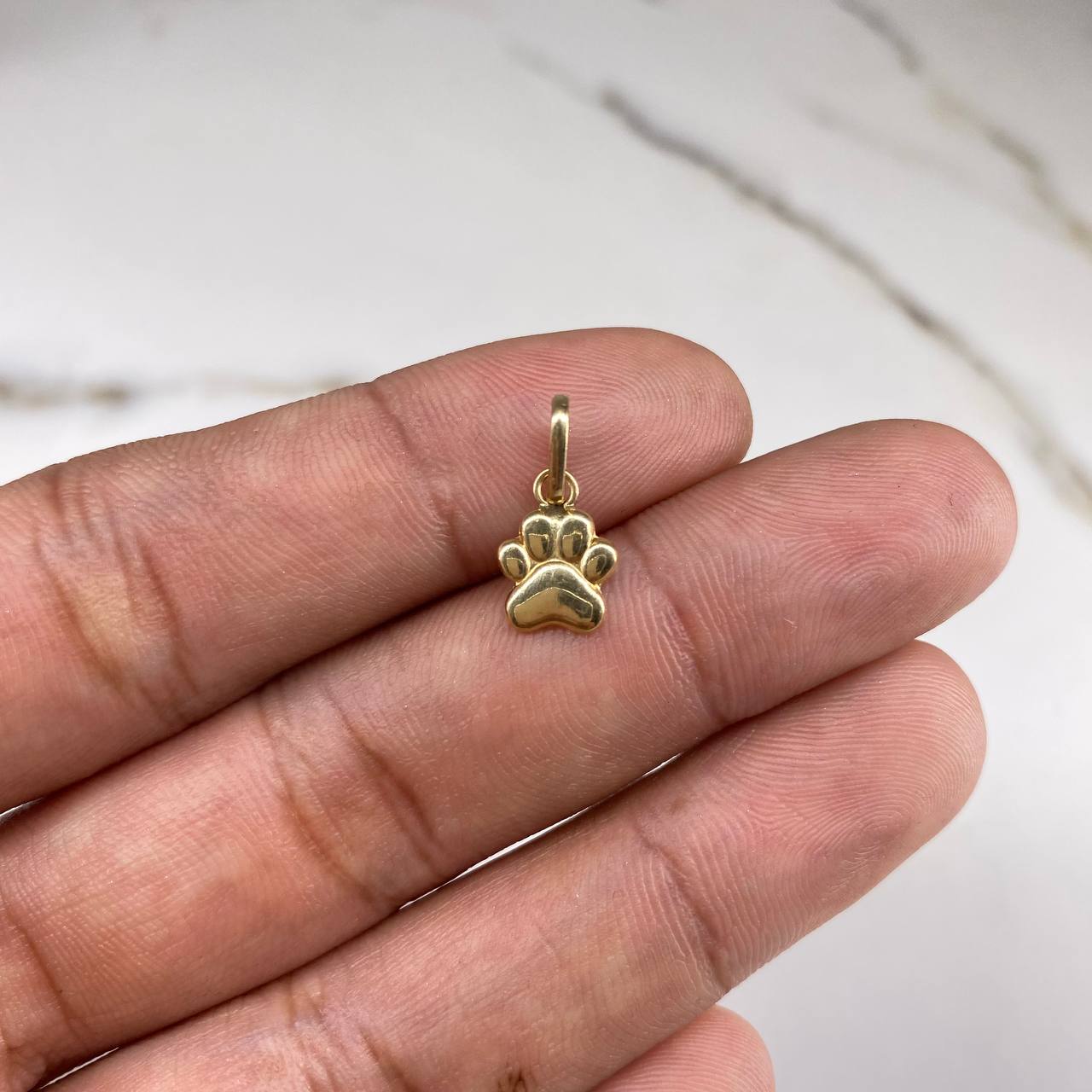 Dije Huella  0.55gr / 1.5cm / Liso  Oro Amarillo &