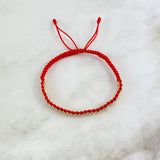 Pulsera Roja Cilindrica 2mm Diamantada 30 und Oro Amarillo (A.C)