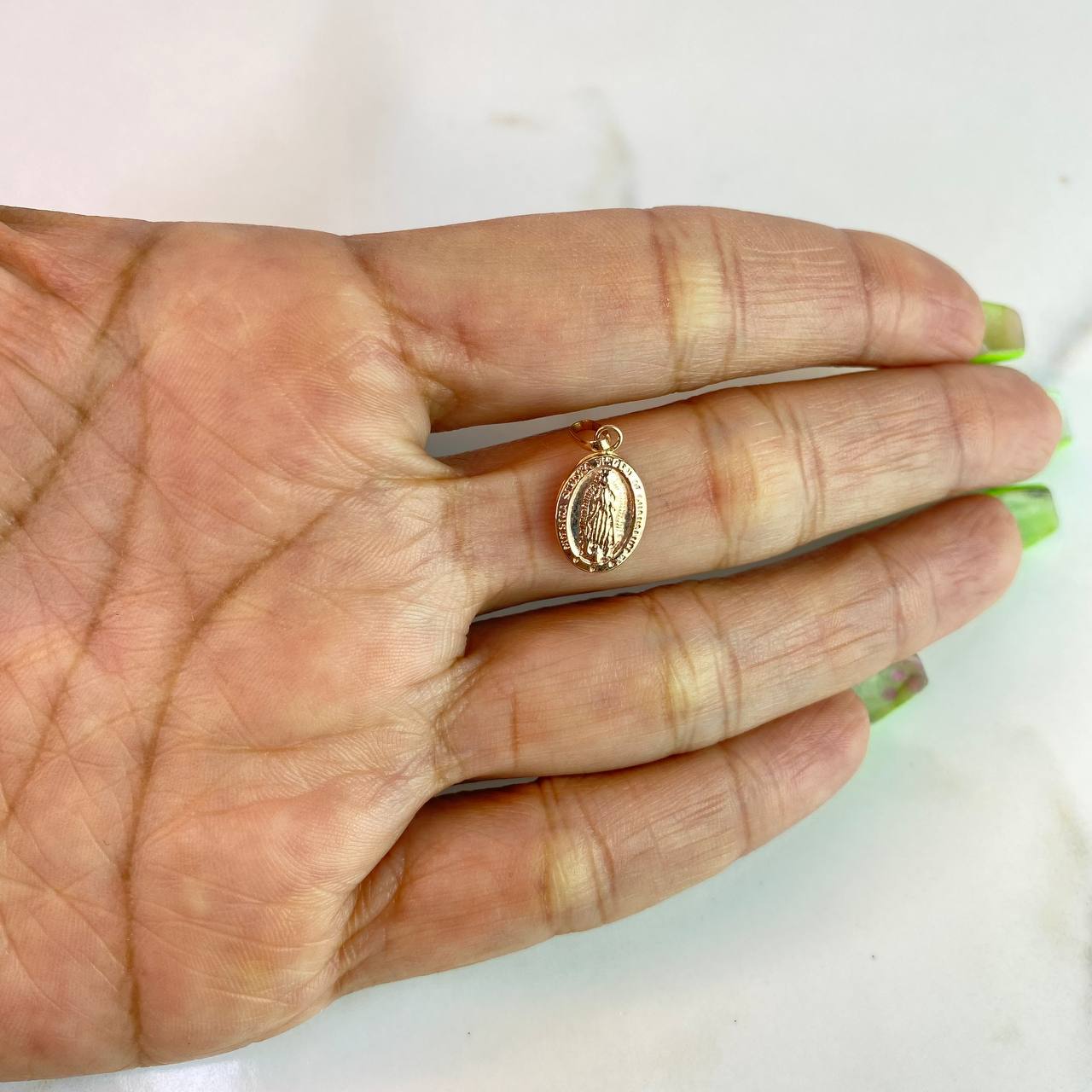 Dije virgen De Guadalupe 0.45gr / 2cm / Troquelado Oro Rosa $
