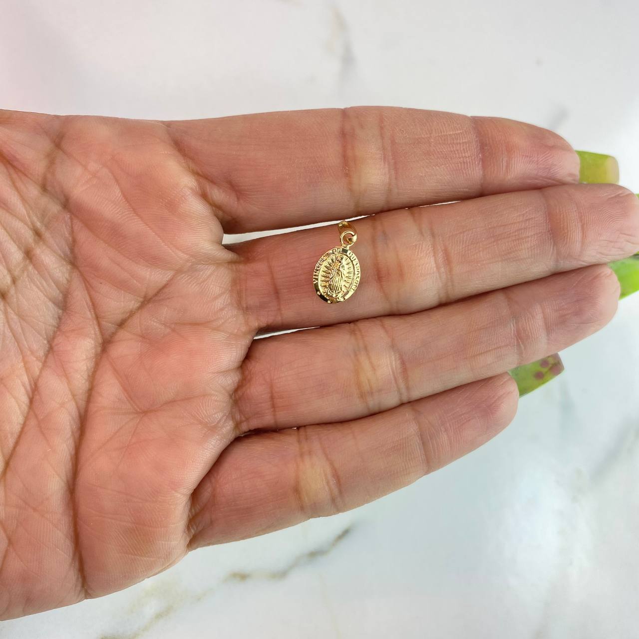 Dije Virgen de Guadalupe 0.5gr / 1.5cm / Troquelado Oro Amarillo $