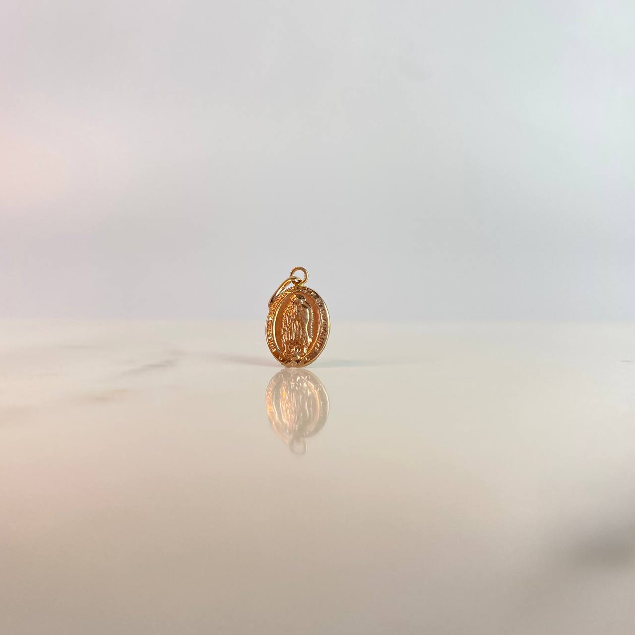 Dije virgen De Guadalupe 0.45gr / 2cm / Troquelado Oro Rosa $