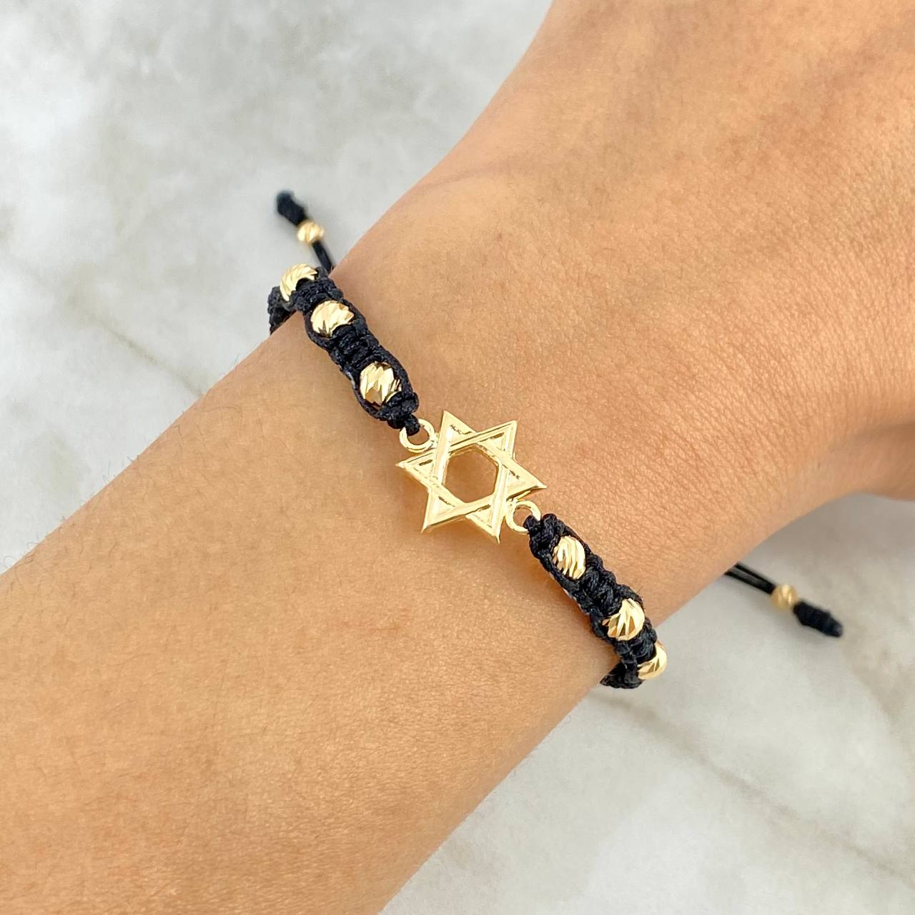 Pulsera Negra Estrella de David 1.05gr / 4mm Bolas Diamantadas 6 und Oro Amarillo *