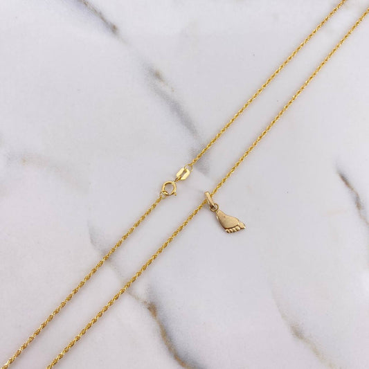 Cadena Lazo 0.95gr / 50cm + Dije Huella 0.30gr / 1.5cm Oro Amarillo (Oferta) $