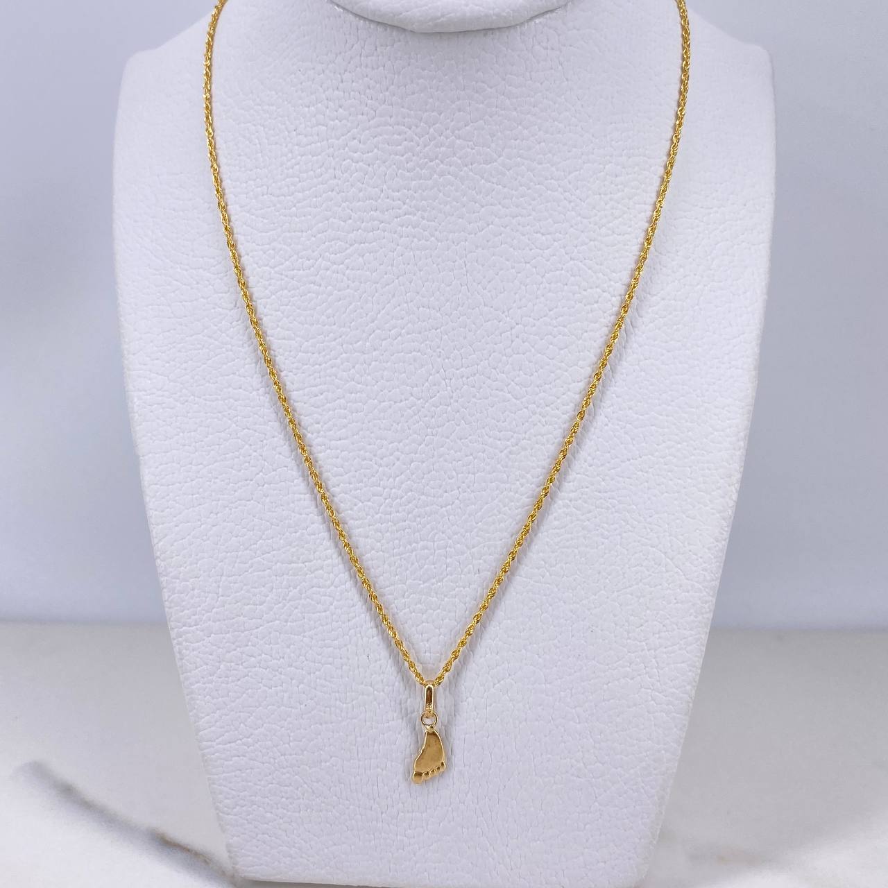 Cadena Lazo 0.95gr / 50cm + Dije Huella 0.30gr / 1.5cm Oro Amarillo (Oferta) $